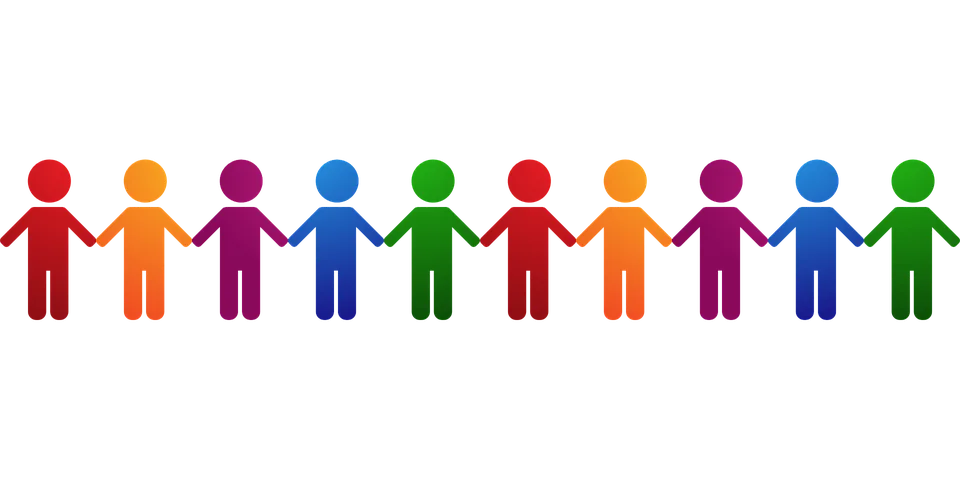 Iconos de figuras humanas de diferentes colores para mostrar diversidad, tomadas de la mano.